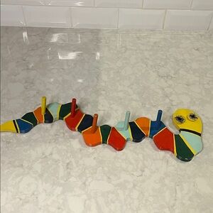 Vintage hand crafted kids’ room snake caterpillar wooden peg rack